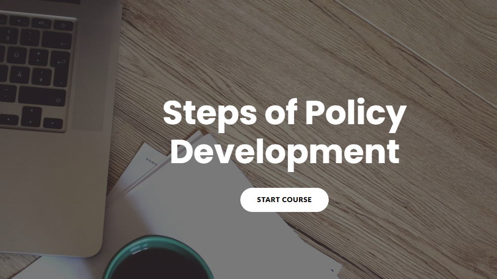 Laptop and mug on a wooden surface with 'Steps of Policy Development' text overlay.
