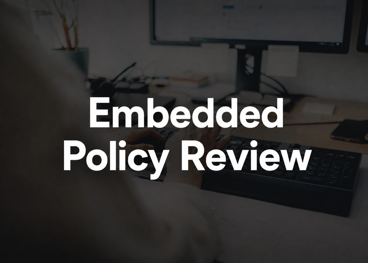 Hof and Associates - Embedded Policy Review package. Dark promotional image with computer background