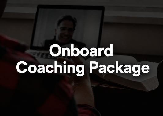 A dark promotional graphic with large white text reading 'Onboard Coaching Package' over a dim scene showing a person at a desk with an open laptop and notebook.
